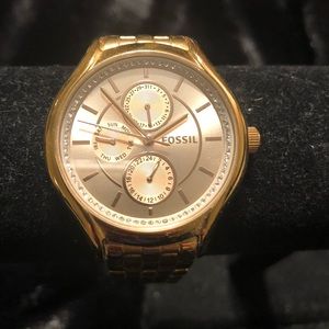 Gold fossil watch